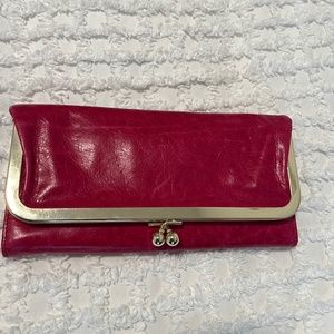 HOBO clutch/wallet in hot pink with gold hardware